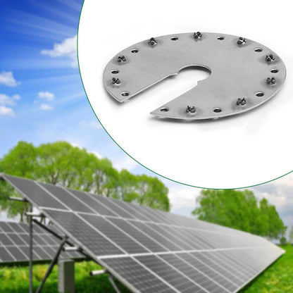 A circular metal solar panel mounting bracket with pre-drilled holes and mounting tabs, shown in a circular inset over a background of solar panels on a grassy hill under a blue sky.